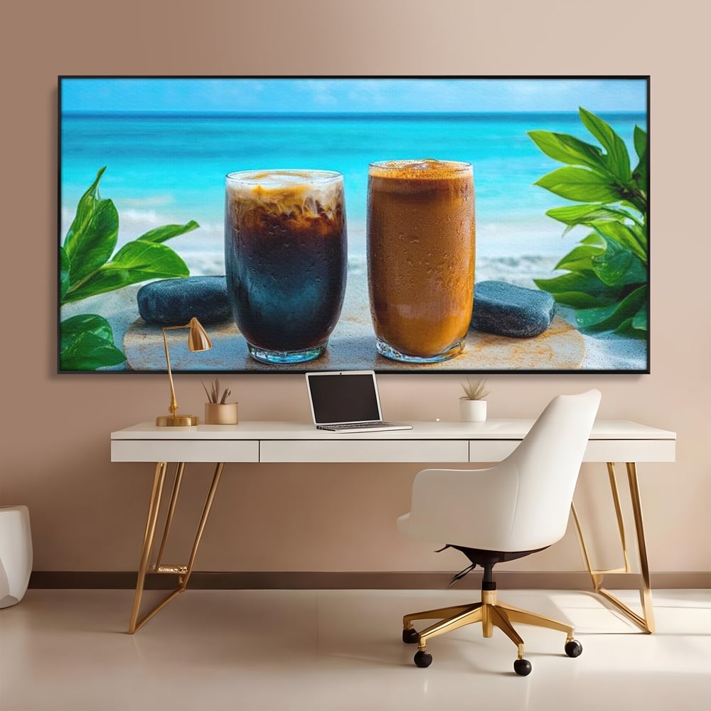 Tablou canvas cu doua pahare cu cafea pe plaja, in rama de aluminiu negru, pe perete intr-un birou
